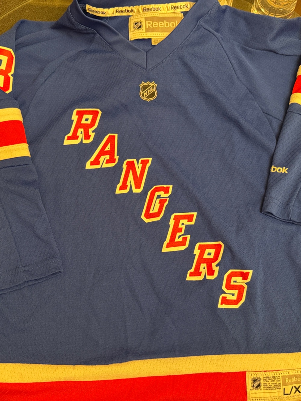 Reebok Blue New York Rangers Hockey Jersey with Red and White Accents